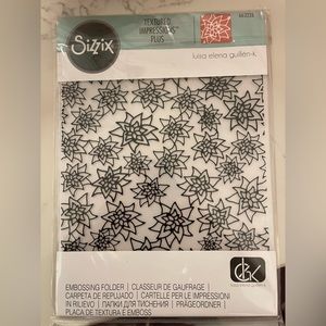 Sizzix Poinsettia extra large embossing folder. 8.5”x11”. Like new condition.